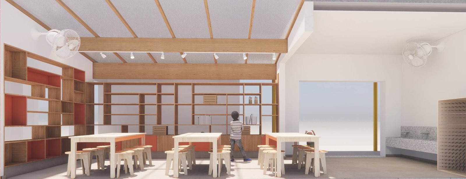 Vista geral do novo ateliê com estantes, mesas, banquetas e a pia coletiva